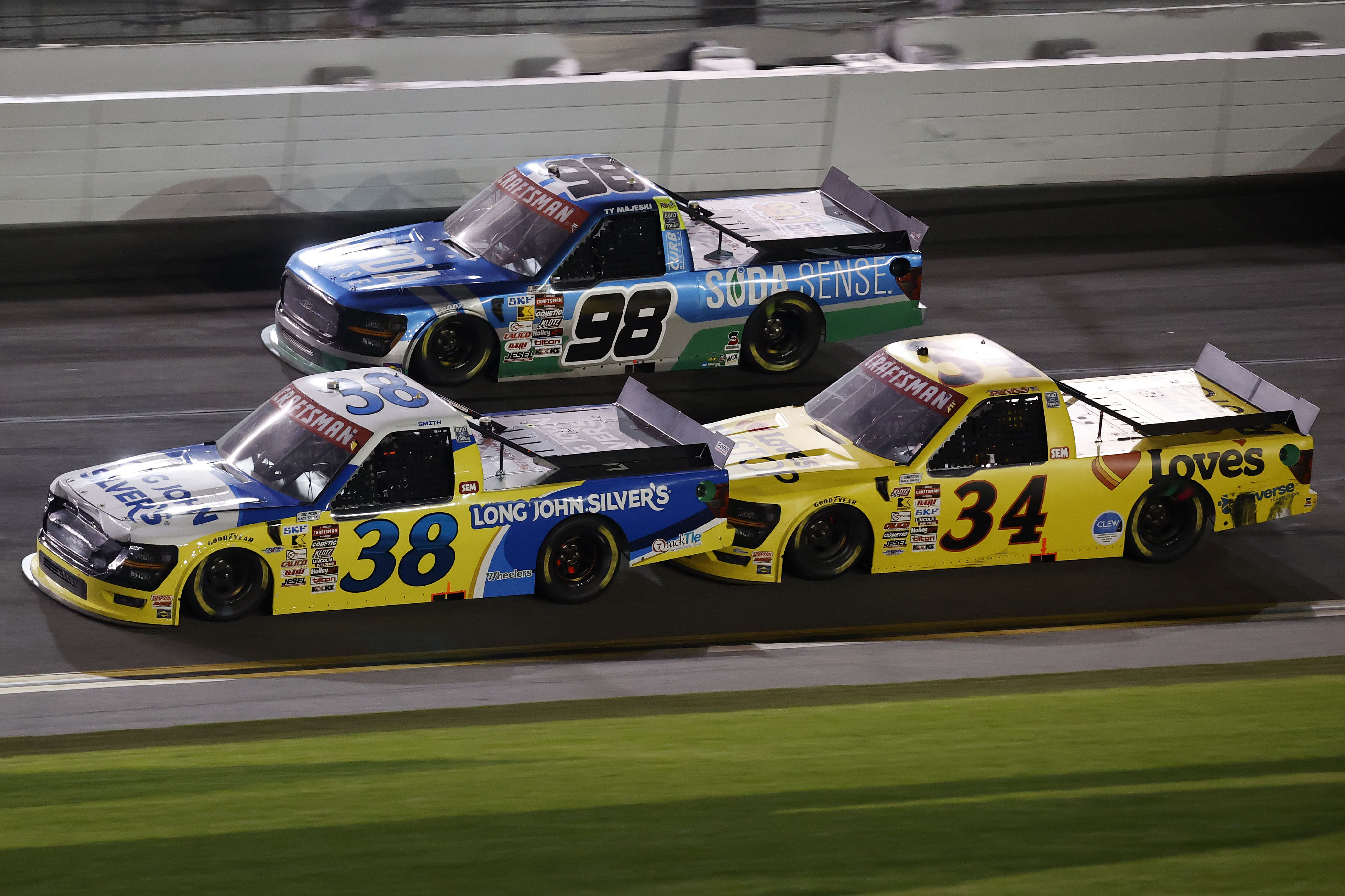 NASCAR Truck Series driver Chandler Smith (38) and driver Ty Majeski (98), and driver Layne Riggs (34) during the Fresh From Florida 250 at Daytona International Speedway - Source: Imagn